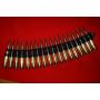 BANDE DE 18 CARTOUCHES DE MITRAILLEUSE BROWNING CALIBRE 50-NEUTRALISEES