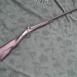 fusil à percussion avec crosse sculptée