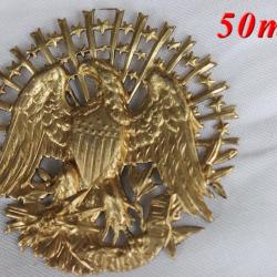 Insigne en métal embouti représentant le sceau des Etats Unis (Refrappe)