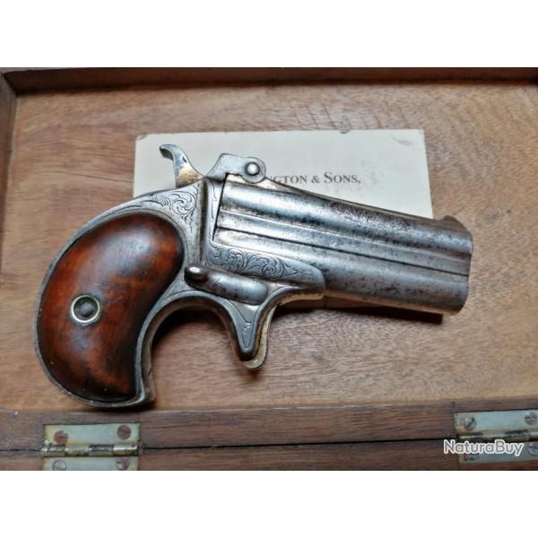 PISTOLET DOUBLE DERRINGER GRAVE VERS 1875