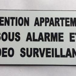 Plaque adhésive "ATTENTION APPARTEMENT SOUS ALARME ET VIDEO SURVEILLANCE" format 48 x 100 mm BLANC