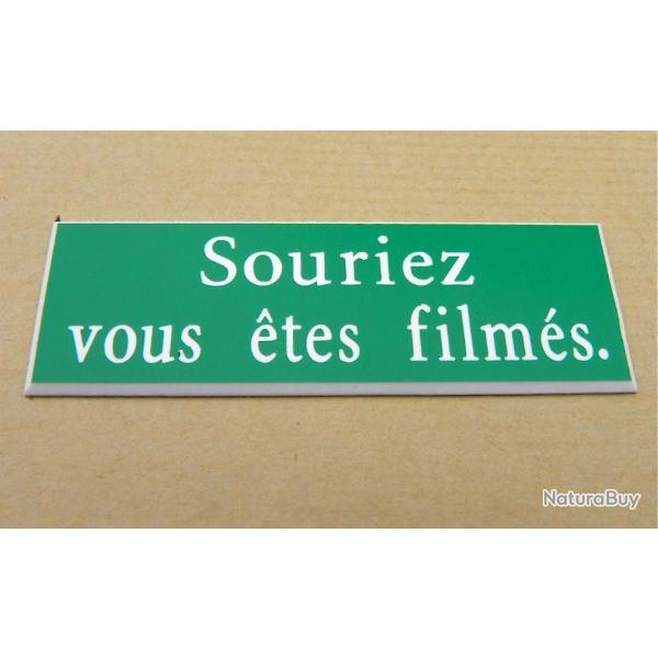 Plaque adhsive pancarte verte "Souriez vous tes films" Format 50x150 mm