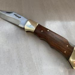 Couteau de poche ou chasse pliant Léopard avec manche en bois de palissandre.