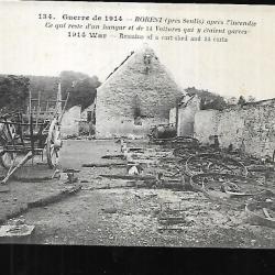 borest après l'incendie ce qui reste d'un hangar et de 14 voitures qui y étaient garé guerre de 1914