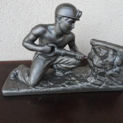 Sculpture Mineur de fond.