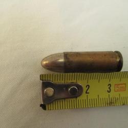 une  balle démilitarisée  de  9 mm extra  long  35 mm  - bergmann daté  1938  - aigle  -