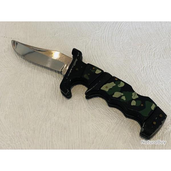 Couteau de poche ou de chasse manche camouflage en mtal.