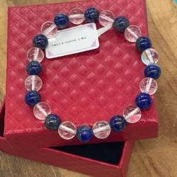 Bracelet cristal de roche /lapis lazuli ( 1 mix )perles 8 mm avec écrin ( Promo de Noel )