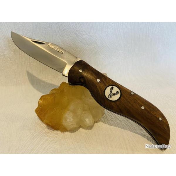 Couteau de poche ou chasse Pradel volution avec son manche en bois de palissandre motif cerf.