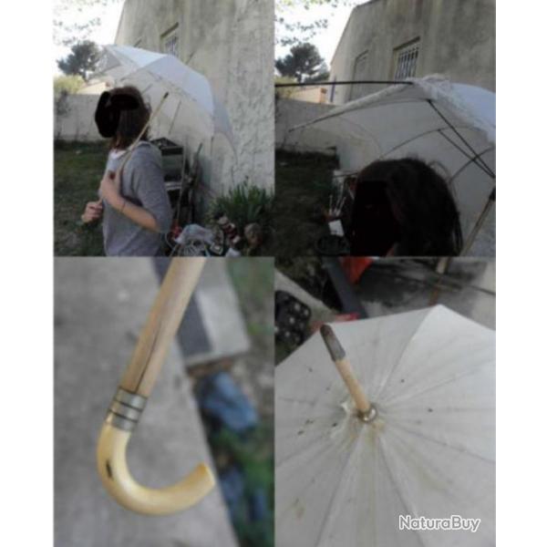 antique parasol Poigne en os et bois