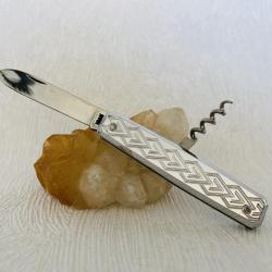 Couteau de poche avec manche brillant avec tir bouchon.