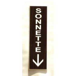 Plaque adhésive SONNETTE + FLECHE en bas couleur noyer Format 29x100 mm