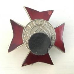Insigne du Parti Nazi NUN ERST RECHT avec Palme émaillée rouge