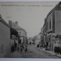 CPA Condé-Sur-Huisne La Grande rue vue de la place Orne