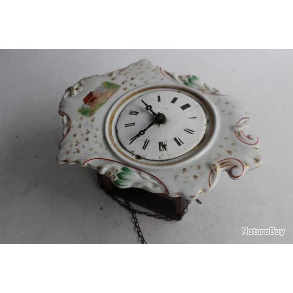 Ancienne horloge murale Fort noire porcelaine pendule