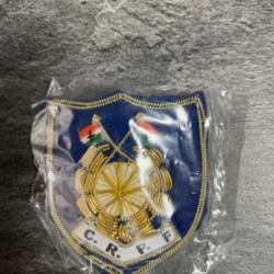 Badge métallique CRPF. Inde.   Frais de port offerts