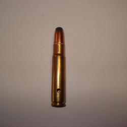 une cartouche de 35 remington neutralisée ogive demi blindée étui percé amorce percutée
