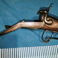 Fusil de chasse à broche de St.Etienne. cal 16, bien conservé,en état de tir. Crans armé et demi ok