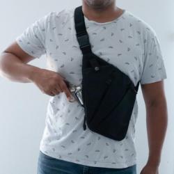 sac (droitier ) de poitrine holster, pour pistolet et revolver . Résistant et pratique .