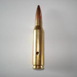 une cartouche de 7mm08 remington pour collection, neutralisée, percée, percutée, ogive pointe creuse