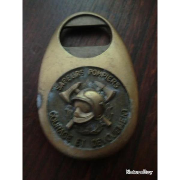 ANCIEN DECAPSULEUR MATIERE BRONZE  SAPEUR POMPIERS COURAGE ET DEVOUMENT