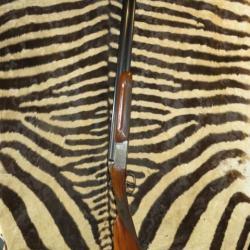 Fusil superposé BOUCHER mdel 747 cal.12/70 1/2 full, éjecteurs, crosse anglaise, mallette cuir