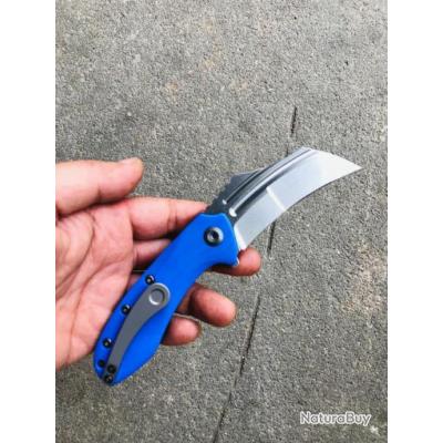 https://one.nbstatic.fr/uploaded/20220629/9304909/thumbs/400f_00001_Couteau-Kansept-KTC3-Dark-Blue-Manche-G10-Lame-Acier-154CM-Linerlock-Clip-KT1031A3.jpg