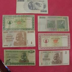 7 billets de banque du Zimbabwe entre 5 et 250,000,000