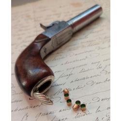 Très joli petit pistolet de pèlerin XIXe avec réserve d'amorces à la coquille