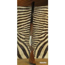Fusil superposé BENELLI 828 U Silver cal.20/76 canon 76 avec 5 chokes et mallette
