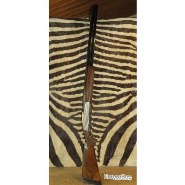 Fusil superpos BENELLI 828 U Silver cal.20/76 canon 76 avec 5 chokes et mallette