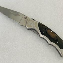 Couteau de poche LAGUIOLE BAROQUE de chasse avec son manche en bois.