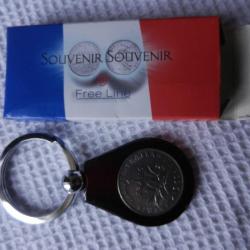 porte clés Souvenir Souvenir By Free Line avec une ancienne pièce de 1 franc