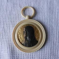 médaille vintage de berceau années 1950