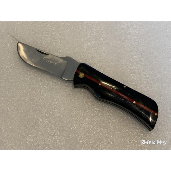 Couteau de poche original Lopard noir et liser rouge.