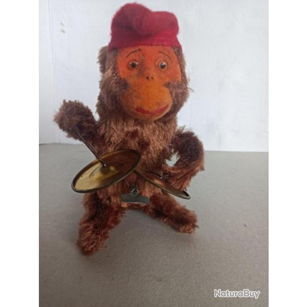 ancien jouet singe batteur de timbales avec sa cl