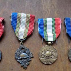 4 médailles militaire 14-18 -3 marqués uni comme au front de l' U N C union des anciens combattants.