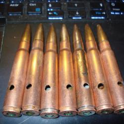 Lot de 7 cartouches NEUTRALISEES  cal. 7.92mm Mauser WW2, présentant une singulière particularité