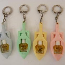 Quatre Flacons de parfum LIF 80° Paris Porte Clefs
