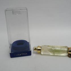 Flacon d'eau de toilette KISS & TELL