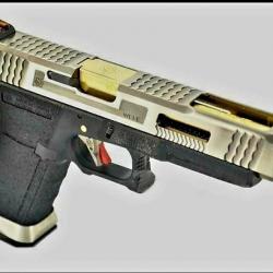 PRE COMMANDE GLOCK34 SILVER SLIDE&GOLD BARREL WE CUSTOM AVEC FIBRE OPTIQUE PHOSPHORESCENT BY PNA