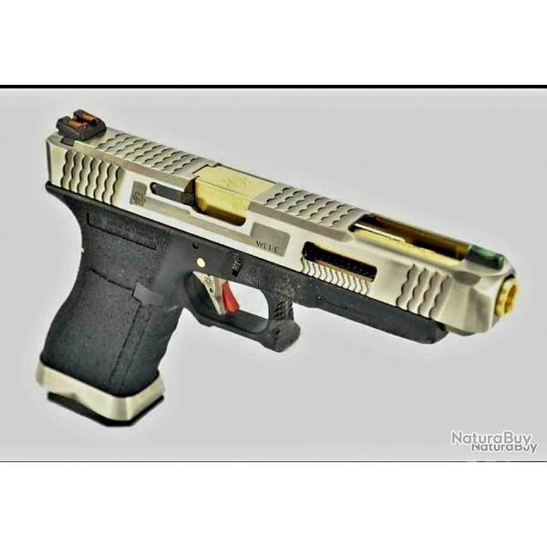 PRE COMMANDE GLOCK34 SILVER SLIDE&GOLD BARREL WE CUSTOM AVEC FIBRE OPTIQUE PHOSPHORESCENT BY PNA