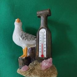 figurine mouette avec thermomètre