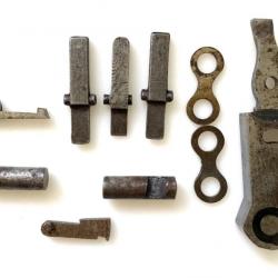 Petit lot de pièces détachées neuves pour fusil de chasse Darne et autres pièces brutes.