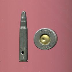7.92 x 57 Mauser - à blanc - étui acier fermé en rosette 4 plis - marquage Yougoslave : nny 1986