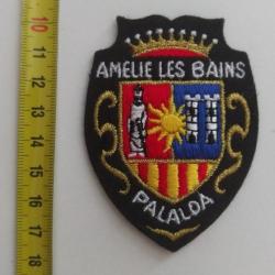 Écusson brodé : " Amélie Les Bains - Palaloa ".