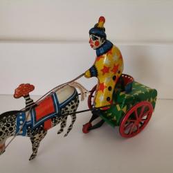 Jouet tôle cirque clown sur charrette avec cheval