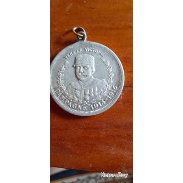 MEDAILLE ALUMINIUM CAMPAGNE 1914/1915"JOFFRE CETTE MASCOTTE AU VAILLANT SOLDAT"