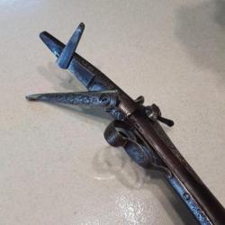 Fusil ancien tête de chien calibre 16