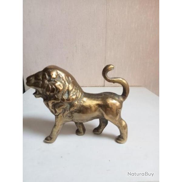 sculpture lion ancien en bronze dor hauteur 10 cm x 12 cm